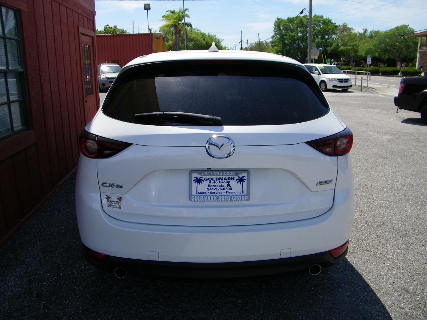 2019 White /Beige Mazda CX-5 Touring (JM3KFACM8K1) with an 2.5L L4 DOHC 16V engine, 6A transmission, located at 4000 Bee Ridge Road, Sarasota, FL, 34233, (941) 926-0300, 27.298664, -82.489151 - Photo#7